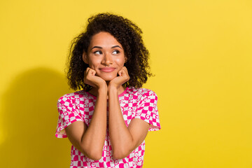 Sticker - Portrait of lovely minded lady hands touch cheeks look empty space imagine isolated on yellow color background