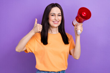 Sticker - Photo of mature age woman yellow t shirt usa president elections day candidate with bullhorn thumb up isolated on purple color background