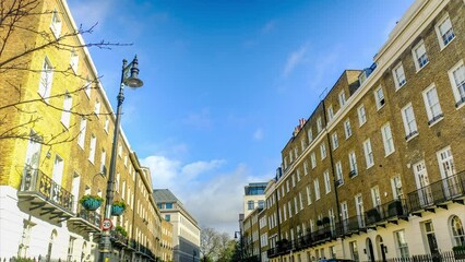 Wall Mural - Time lapse of upmarket street of London townhouses- UK