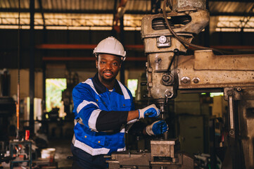 Production engineers are assisting adjusting and maintaining factory machine, Male workers technician examining control the industrial technology tool, professional repair men work in industry plant