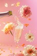 Pouring a champagne into a glass while flowers fly in the background. Pastel pink and orange background. Summer and Spring drink aesthetic idea.