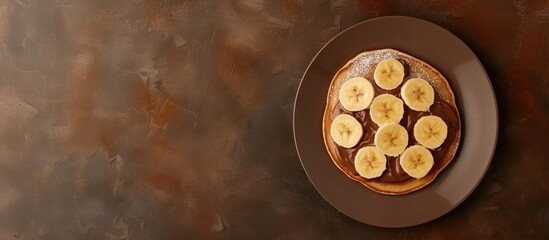 Fototapete - Crepes stuffed with chocolate spread and banana Thin pancakes Sweet dessert French cuisine top view. with copy space image. Place for adding text or design