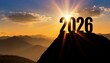 © adobedesigner - Year 2026, concept. New Year 2026 at sunset. Silhouette 2026 stands on a mountain with sun rays at sunrise, creative idea.