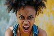 attractive angry african woman shouts with great anger