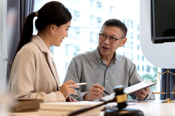 Wall Mural - lawyer and client are talking and consulting  listening to analytical data