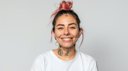 Wall Mural - young woman with a cheerful smile, sporting a trendy top bun with pink hair, a nose ring, and visible tattoos, embodying a modern and joyful aesthetic.