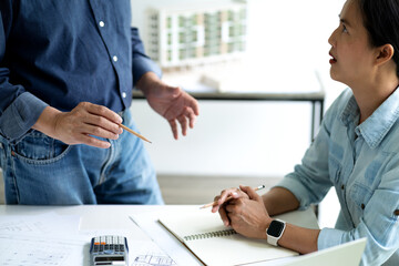 Wall Mural - Architect or engineer are discussing and consulting in the office