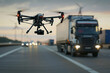 A soaring drone captures the juxtaposition of the open sky and the bustling road as it hovers above a powerful truck, its wheels churning on the land and its trailer laden with the weight of freight 