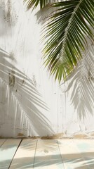 Wall Mural - Palm leaves shadow on a white concrete wall