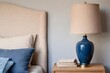 © 360VP - A bedroom with blue pillows and a blue lamp close-up. Cozy interior of a private house or modern apartment.