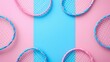© artem - Artistic arrangement of badminton rackets on dual tone background
