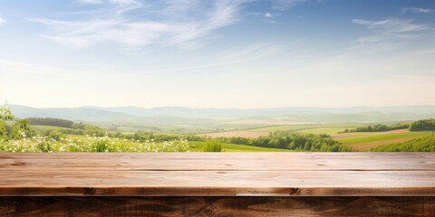 Wall Mural - Empty desk made of wood, with a view of the countryside in spring