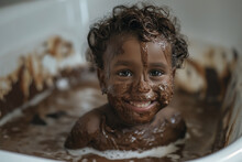 Beautiful Smiling Children's Day Child Celebrating Easter Inside A Tub Full Of Creamy Chocolate Dessert