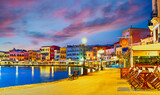 Fototapeta Morze - Chania, Crete,Greece: Old venetian harbour at sunrise with empty streets