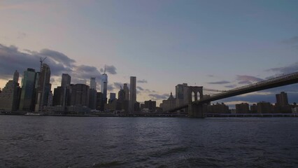 Wall Mural - Gimbal shot of the Brooklyn bridge from DUMBO at sunset