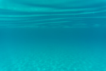 Wall Mural - View of the sea and sand from beneath the surface. High quality photo