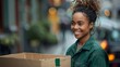 Smiling Delivery Woman on the Job. A cheerful Afro-American delivery woman holding a package, captured in an urban setting with a delivery truck in the background.