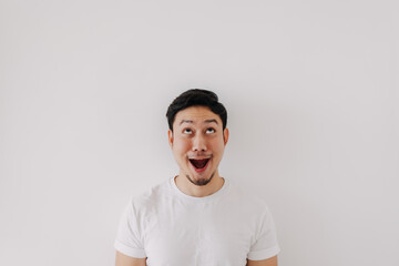 Wall Mural - Happy funny big smile face of Asian man wears white t-shirt portrait isolated on white background.