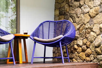 Summer lounge terrace. Patio area with two chairs and table.