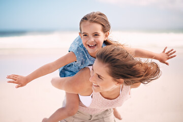 Wall Mural - Mother, child and piggyback, airplane on the beach for bonding and love, travel and vacation in Mexico. Happiness, care and trust, woman and daughter playing game with flying and family time outdoor