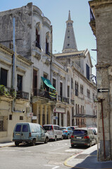 Wall Mural - Urban street view with historic house building facades cityscape in downtown Montevideo, Uruguay shabby South American Latin architecture style exterior building skyline	