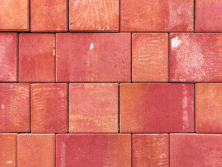 Wall Mural - Red paving slabs as an abstract background. Texture