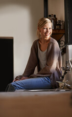 Poster - Portrait, young woman and relax at home on the kitchen counter in Australia on the weekend. Rest, female person and face for calm house and lifestyle with peaceful and casual fashion or style