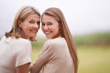 Poster - Mother, daughter and portrait for outdoor, bonding and face with autumn for love and happiness. Mature female person, young woman and smile for family, nature and together with mom for vacation