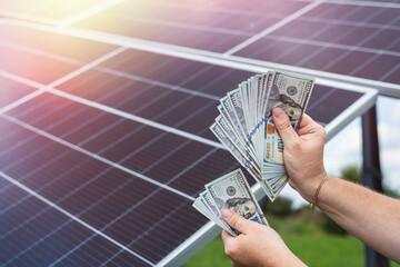 Wall Mural - engineer profits from solar stations, renewable energy from the sun