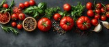 Fototapeta Kuchnia - Tomatoes and basil on a dark background.