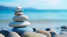 Sea Glass Stones Arranged In A Balance Pyramid On The Beach. Beautiful Azure Color Sea With Blurred Seascape Background. Meditation And Harmony Concept