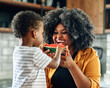 © Lumos sp - child family kitchen food boy son father mother watermelon fruit slice summer organic meal fun preparing healthy diet eating home black