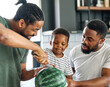 © Lumos sp - child family kitchen food boy son father watermelon fruit slice summer organic meal fun preparing healthy diet eating home black