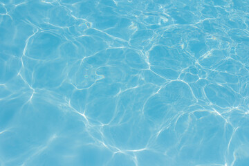  The light reflects blue in the water in the swimming pool. It looks fresh and lively, suitable for use as a wallpaper.