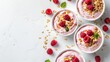 Bowls of healthy strawberry yogurt on white background