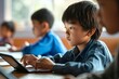 Focused Asian school boy using digital tablet at class in classroom. Attentive junior school student learning online virtual education digital program, Generative AI