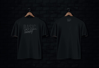 Sticker - Men's black short sleeve t-shirt mockup in black wall surface with dark bricks. Front view. Vector template.