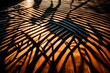 A heart-shaped pattern created by shadows cast on a wooden surface when sunlight filters through an intricate lattice.