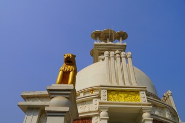 Wall Mural - golden lion in dhauli shanti stupa