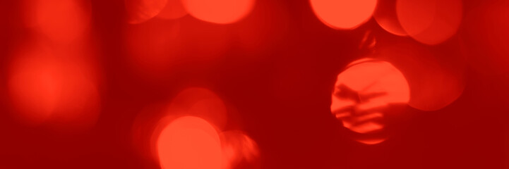 Wall Mural - Blurred lights red background, banner texture. Abstract bokeh with soft light header. Wide screen wallpaper. Panoramic web banner with copy space for design