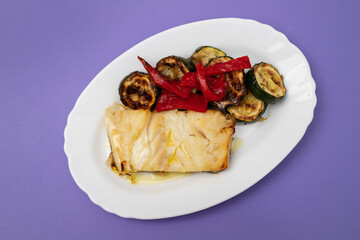 Wall Mural - Fish dish - fried cod fish with grilled vegetables in plate