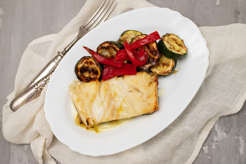 Poster - Fish dish - fried cod fish with grilled vegetables in plate