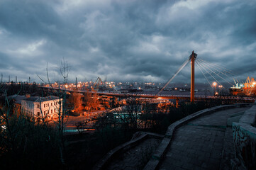 Wall Mural - Odessa, Ukraine – view of the Odessa port from Mother-in-law Bridge, sunset overlooking the Odessa Bay, industrial landscape