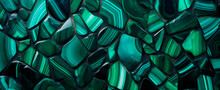 Vivid Green Malachite Stones With Unique Stripes Form A Textured Backdrop, Exuding A Sense Of Luxury And Natural Beauty