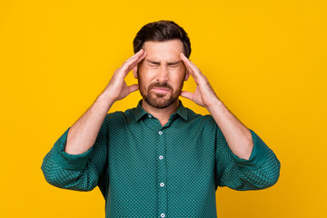 Poster - Photo of suffering stressed man dressed dotted shirt fingers on forehead close his eyes due to pain isolated on yellow color background