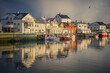 © Travel 'n' Lifestyle - View of a small town along the fjord coastline on Lofoten islands, Scandinavia, Norway.