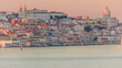 Panorama of Lisbon historical center and ferry terminal Terreiro do Paco aerial timelapse during sunset from above. Portugal