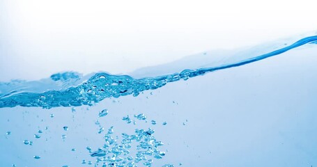 Wall Mural - Many bubbles in water close up, abstract water wave with bubbles in slow motion