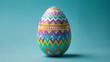 A vividly colored Easter egg boasting geometric patterns, set against a clean background for easy text placement