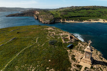 Aerial View Of Saint Paul Statue Overlooking The Beautiful Mellieha Coast, Northern Region, Malta.